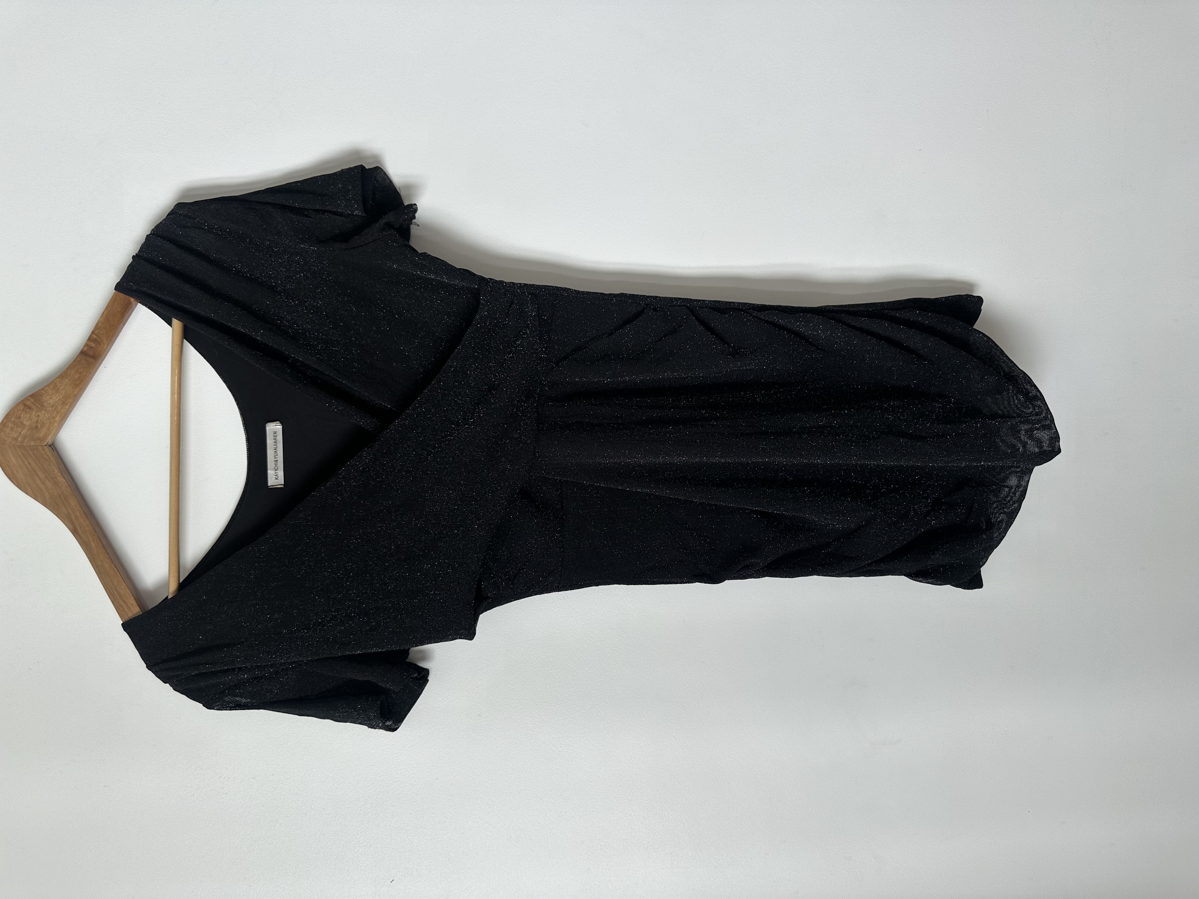 Black shimmery dress with cut-outs