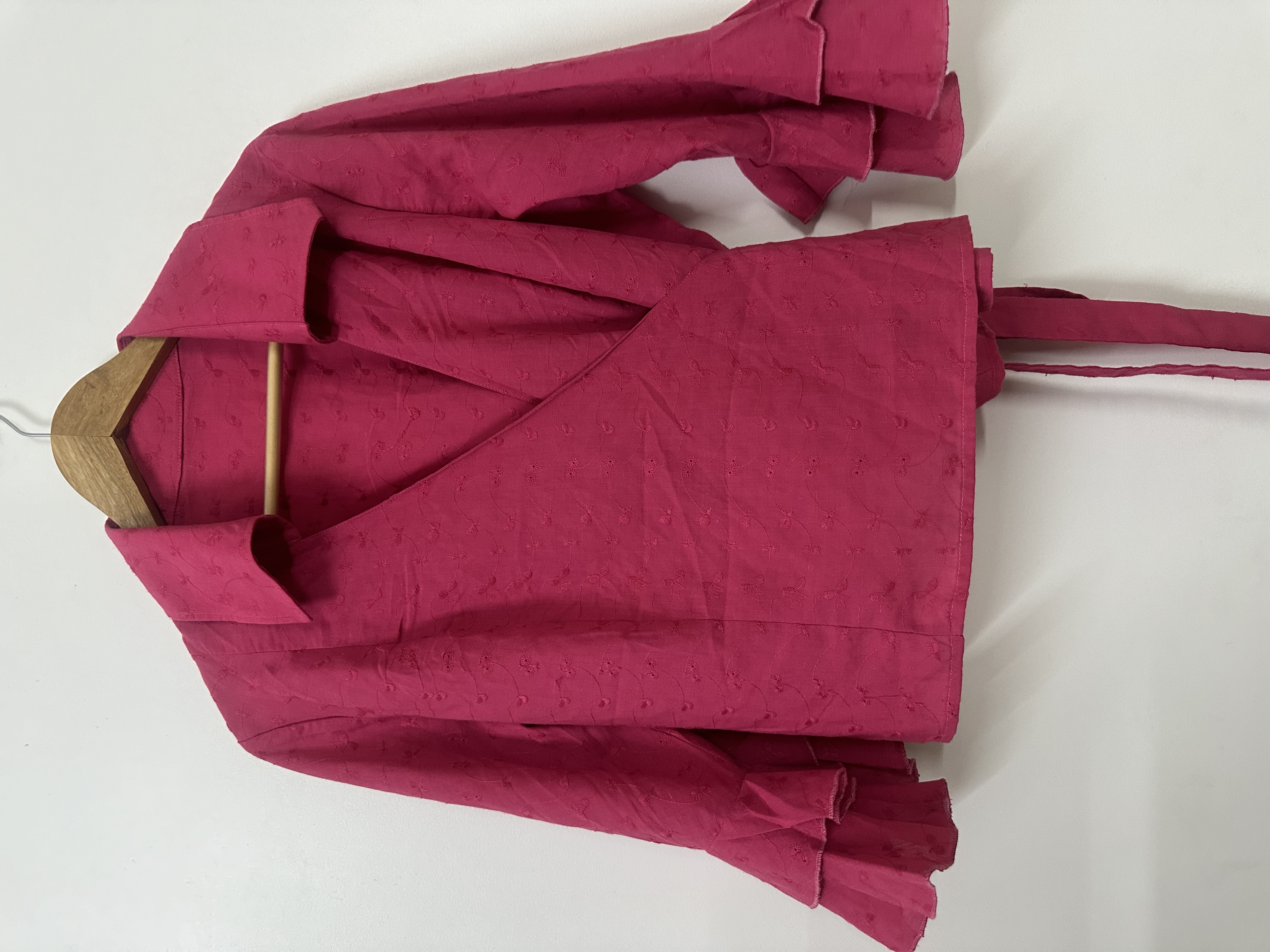 Embroidered pink wrap around blouse